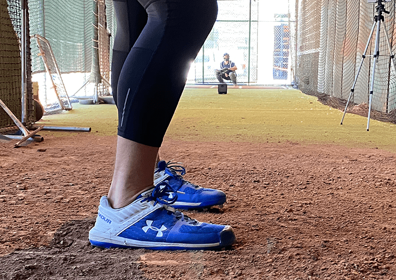 An athlete on a pitching mound.