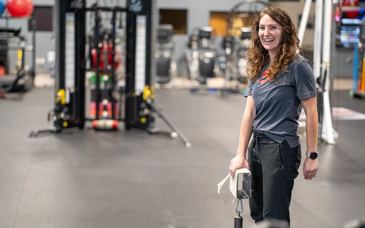 Carly Szemerey in a clinic gym.