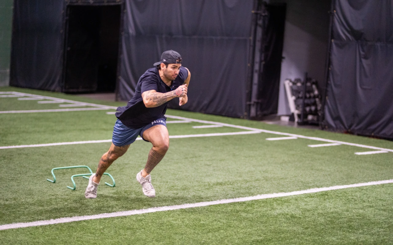 Ernie Atkins running on turf