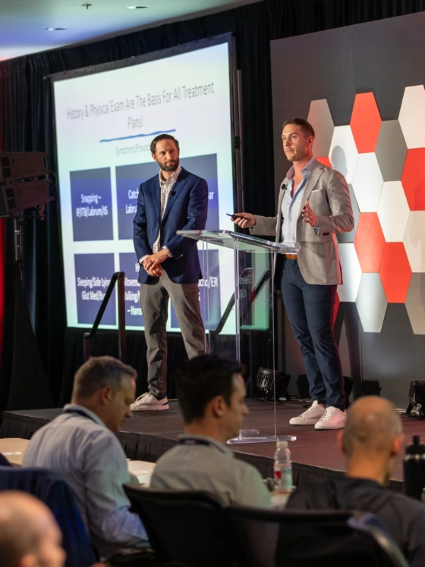 2 speakers at the Huddle Sports Medicine Conference.