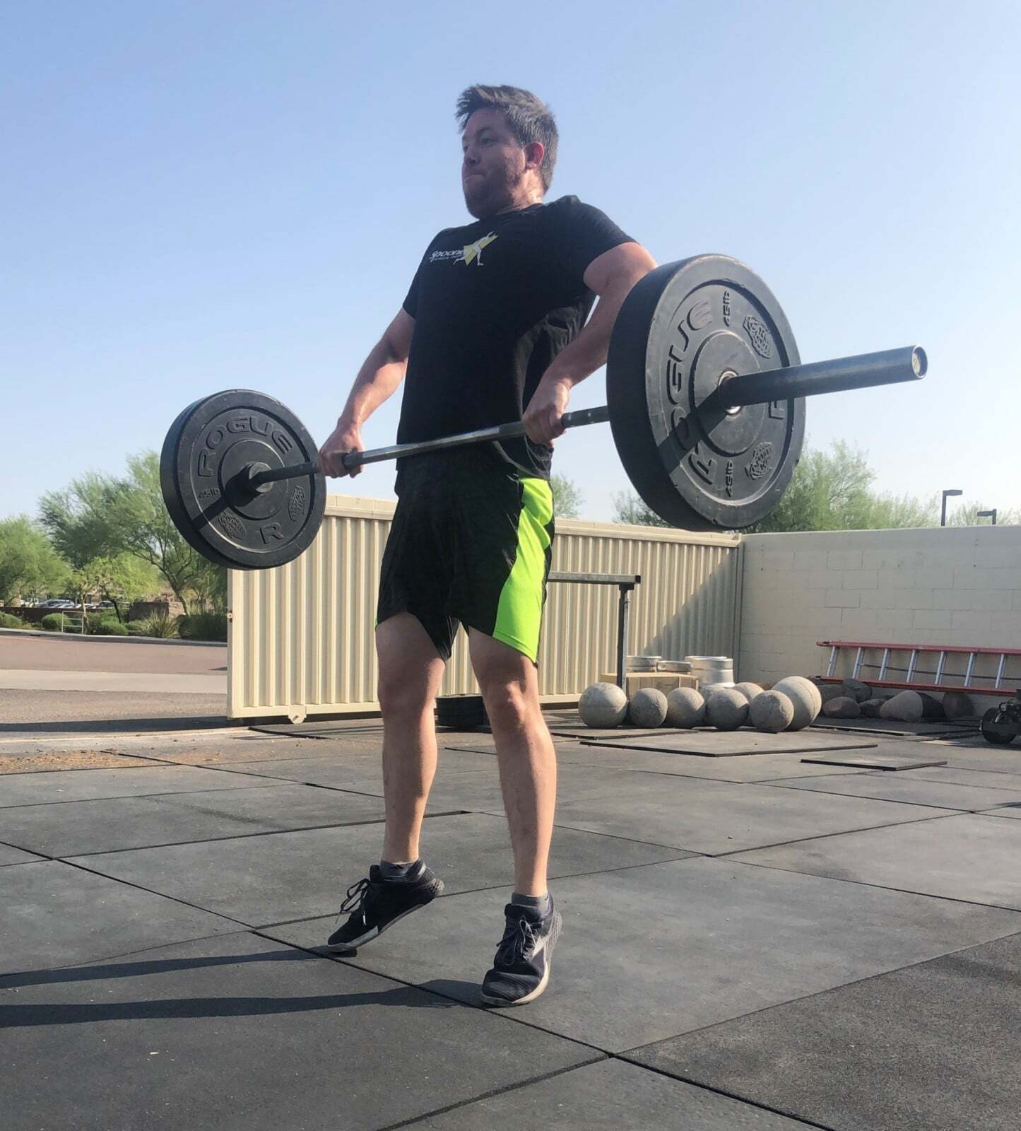 A man performing a deadlift.