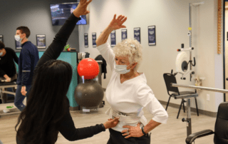 image of therapist working with PWR Parkinson's patient