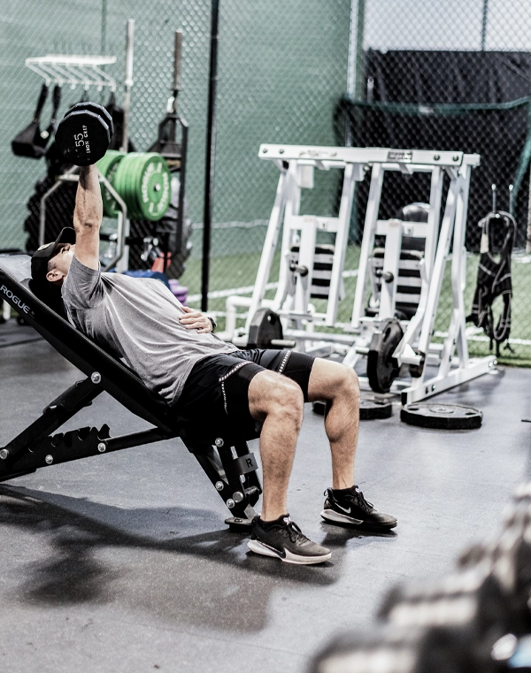 WEIGHTROOM3rev Image of high school off season training.