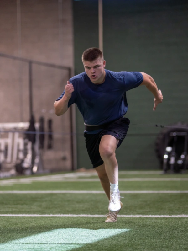 Speed Training Body Image A man sprinting.