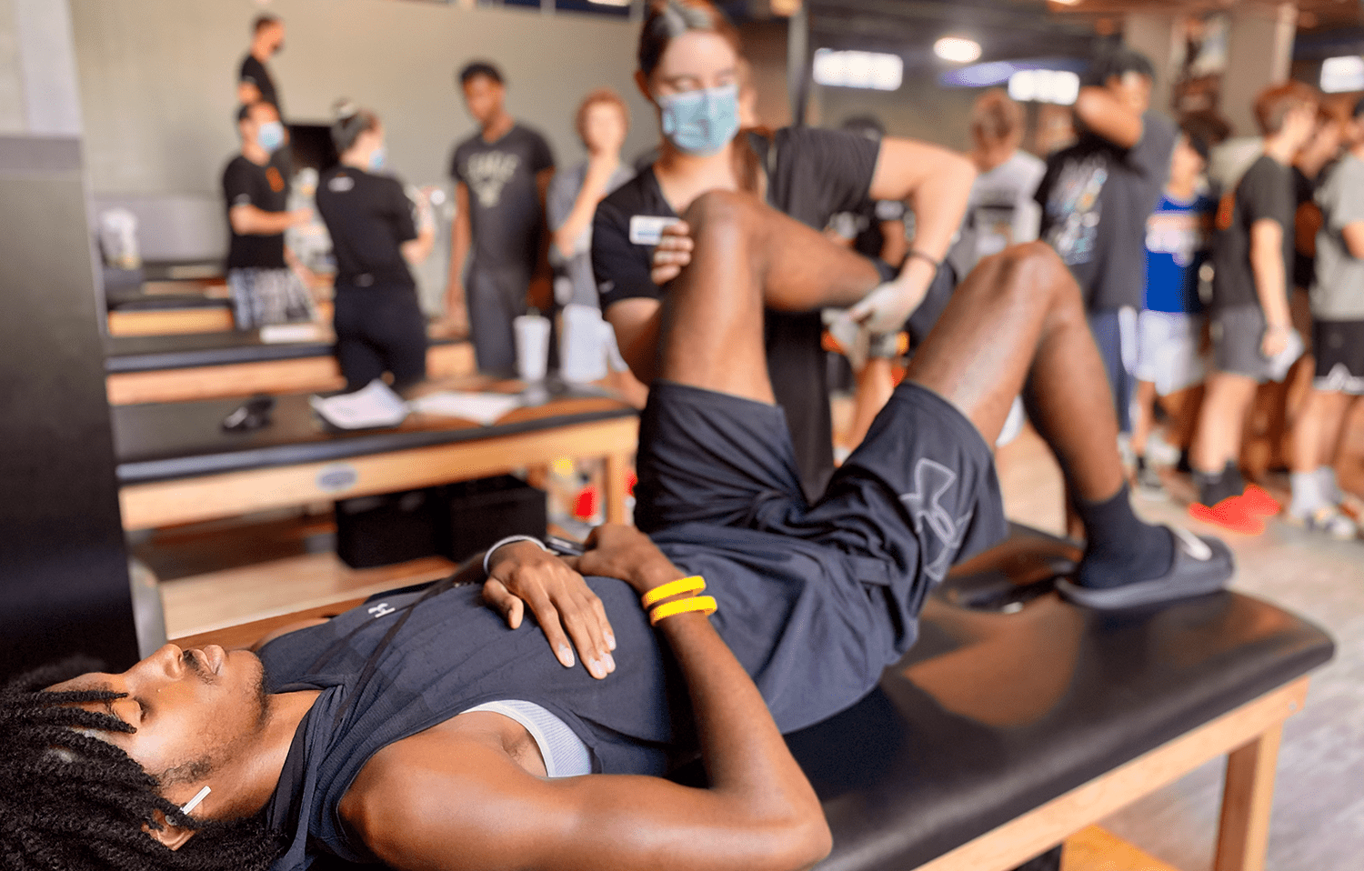 Young athlete being treated for pain management