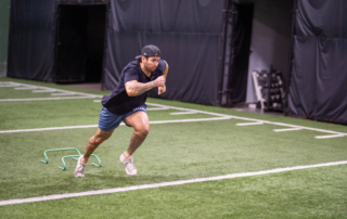 Ernie Atkins running on turf