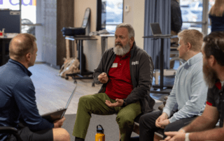 A therapist mentoring other therapists.