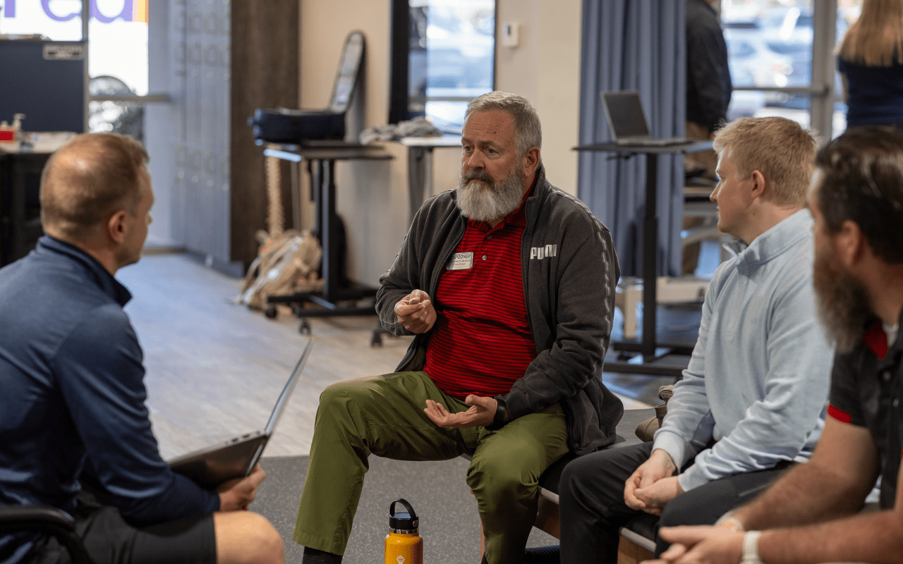 A therapist mentoring other therapists.