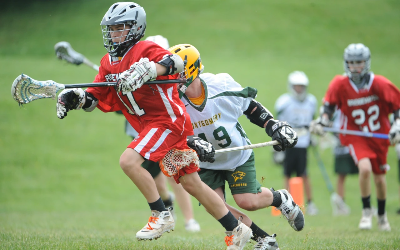 Lacrosse players playing lacrosse.