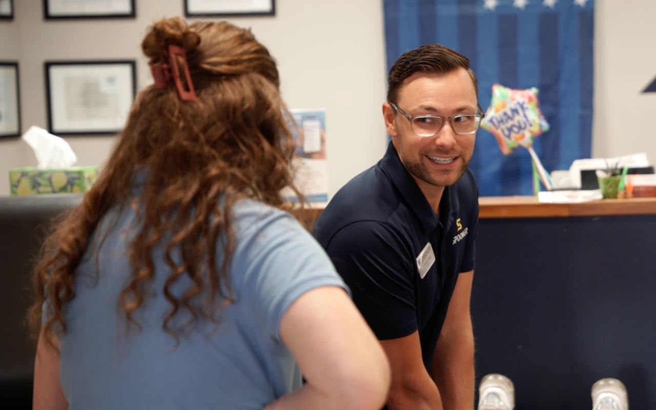 Image of Eric with his student, Sarah.