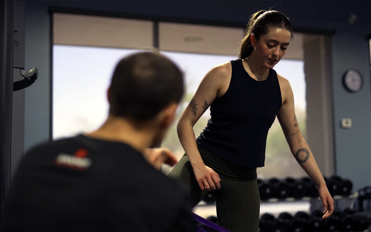 Image of a patient training with a physical therapist.