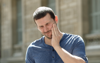 man with jaw pain