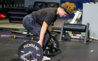 female athlete weight training