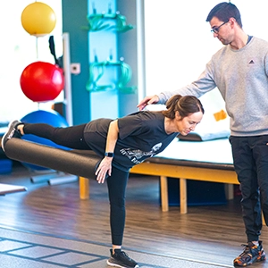 physical therapy patient working on single-leg balance