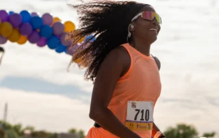 A woman running in a marathon.