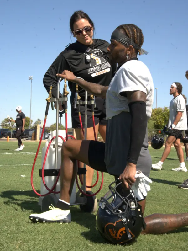 Rattlers Image A Rattlers player getting coached from a Spooner physical therapist.