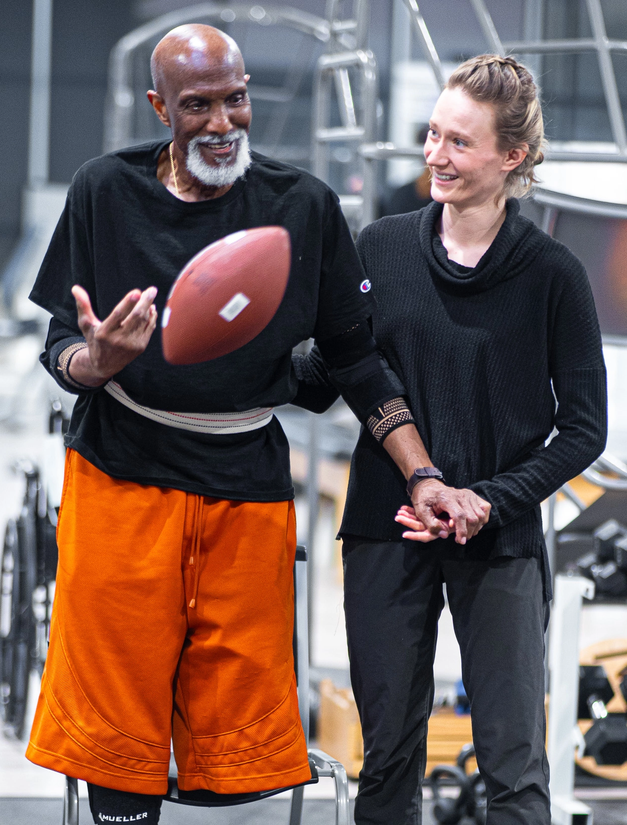 physical therapist with a patient who is an amputee