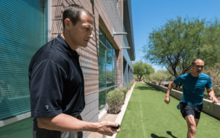 Torrey Foster, physical therapist training with athlete in recovery