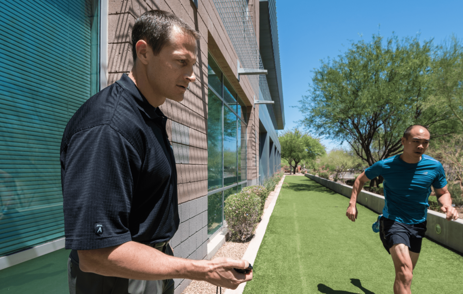 Torrey Foster, physical therapist training with athlete in recovery