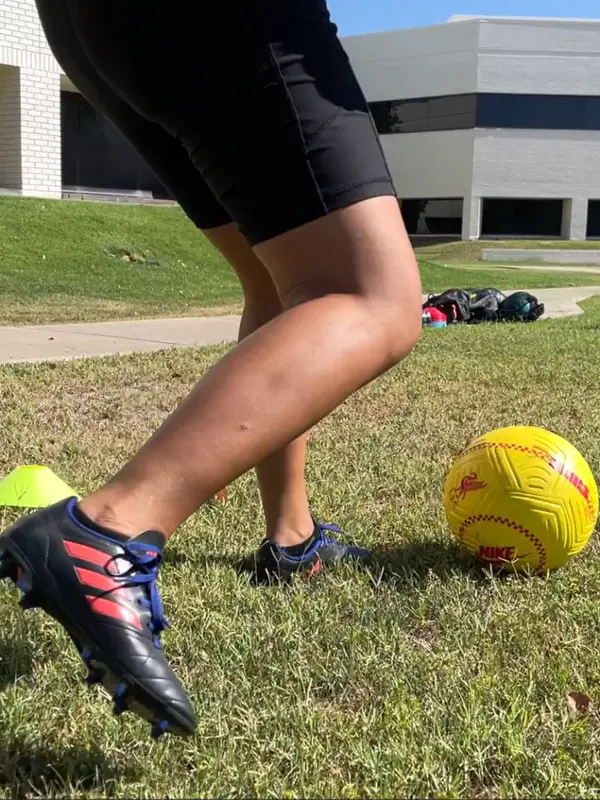 Soccer Image A teenager kicks a soccer ball.