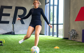 A female soccer athlete preparing for the upcoming soccer season at Spooner Goodyear.