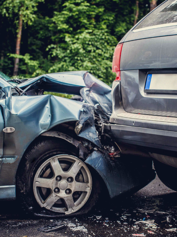 Image of a auto accident involving two cars. Image of an ACL patient on blue balance pad throwing a ball.