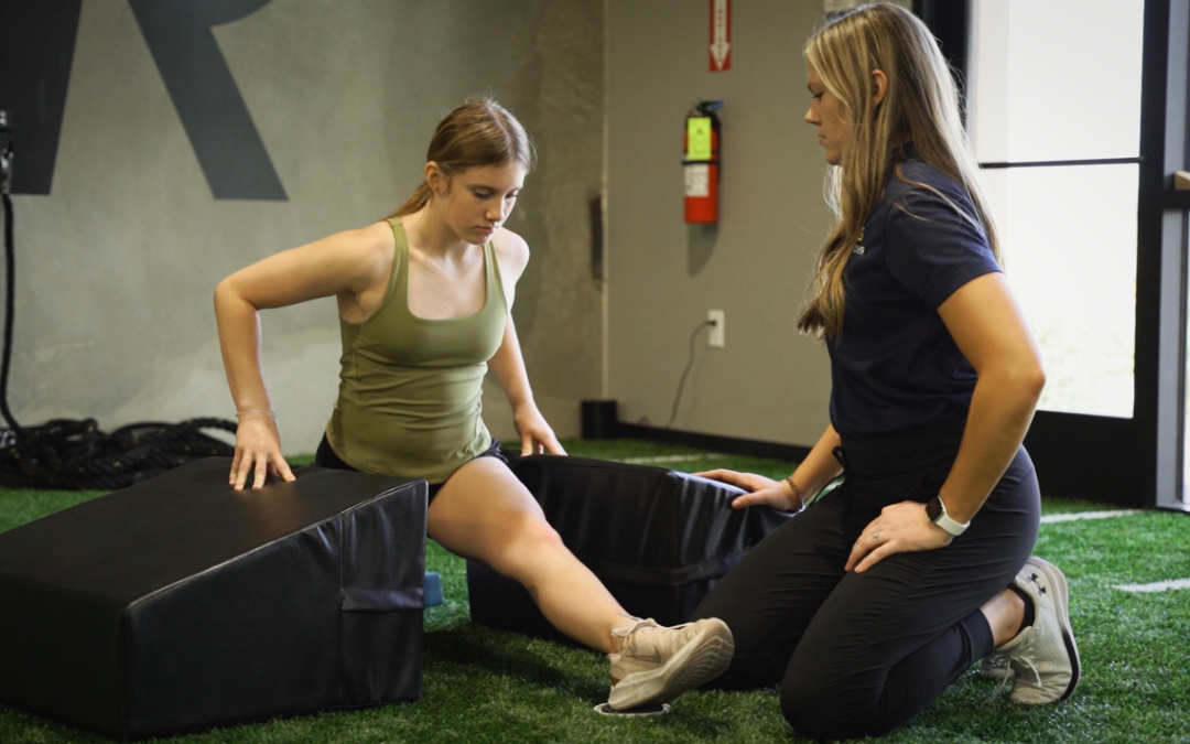 Feature image of an woman testing the flexibility in her legs.