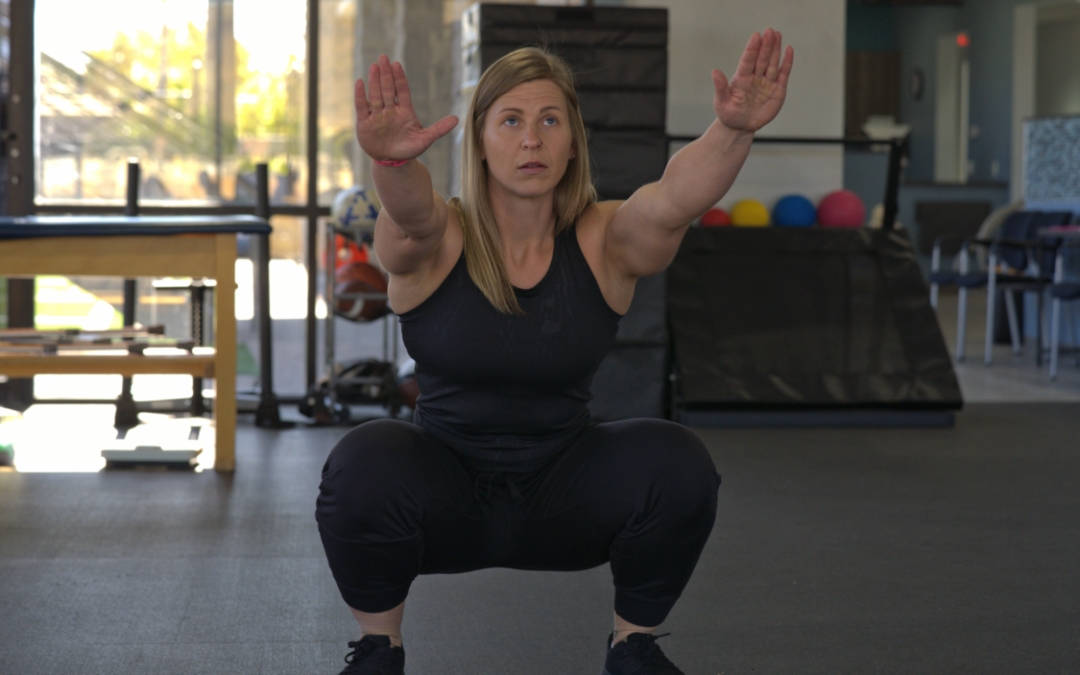 Feature image of a woman looking forward and squatting.