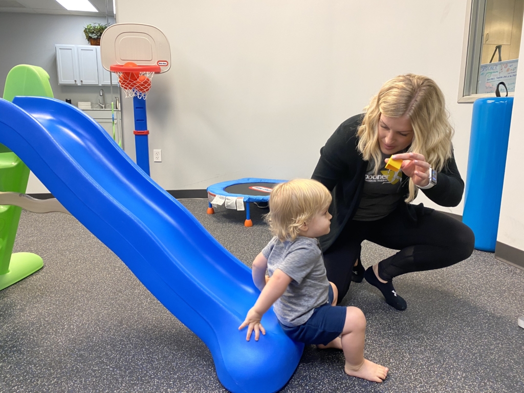 Toddler on slide